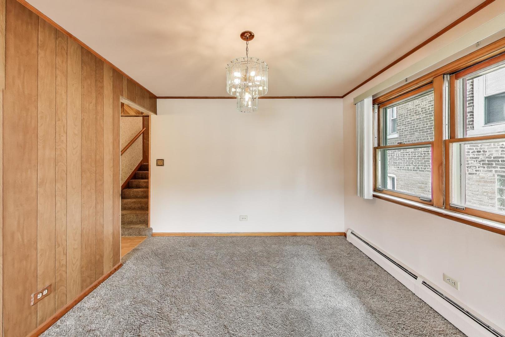 4121 Maple Avenue Lyons, IL 60534 - Photo 5 of 32 wooden floor in an empty room with a window