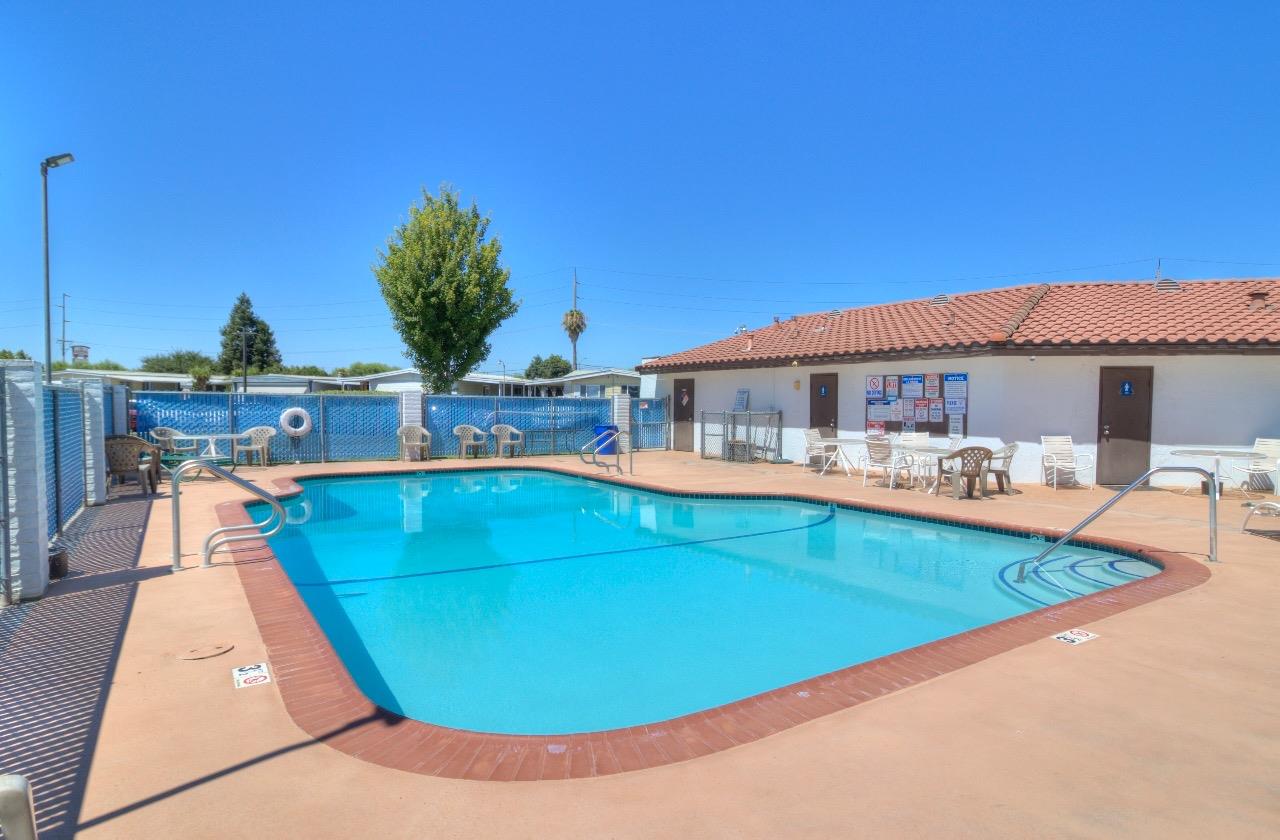 15820 South Harlan Road, Unit 5 Lathrop, CA 95330 - Photo 17 of 18 a view of a swimming pool with a patio