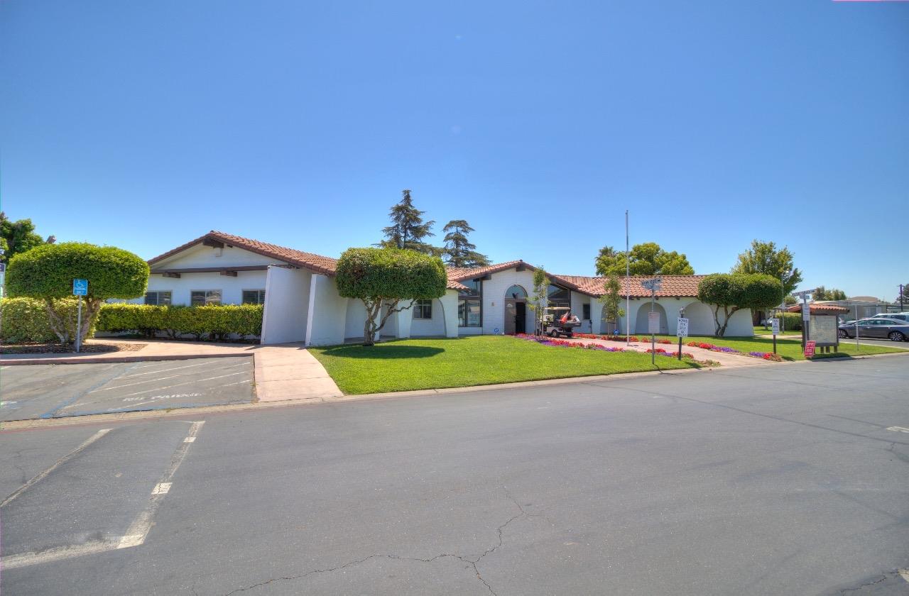 15820 South Harlan Road, Unit 5 Lathrop, CA 95330 - Photo 18 of 18 a view of an house with swimming pool and yard