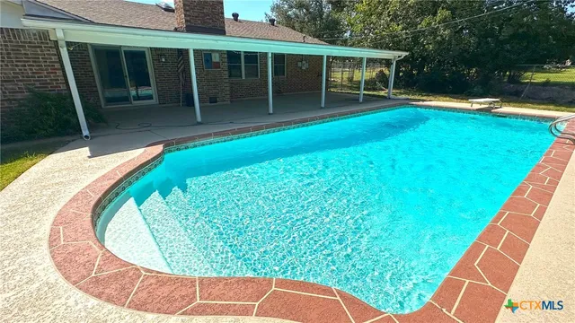 an outdoor view with a swimming pool