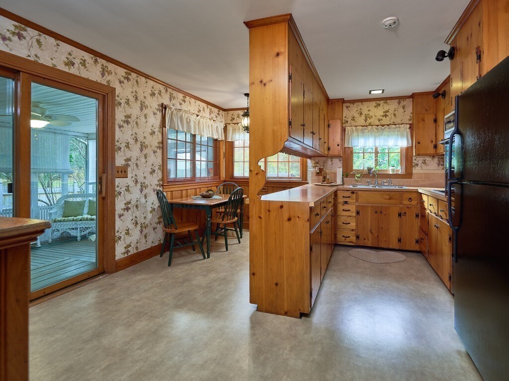 71 Old Common Road Lancaster, MA 01523 - Photo 13 of 39 a kitchen that has a sink and a refrigerator