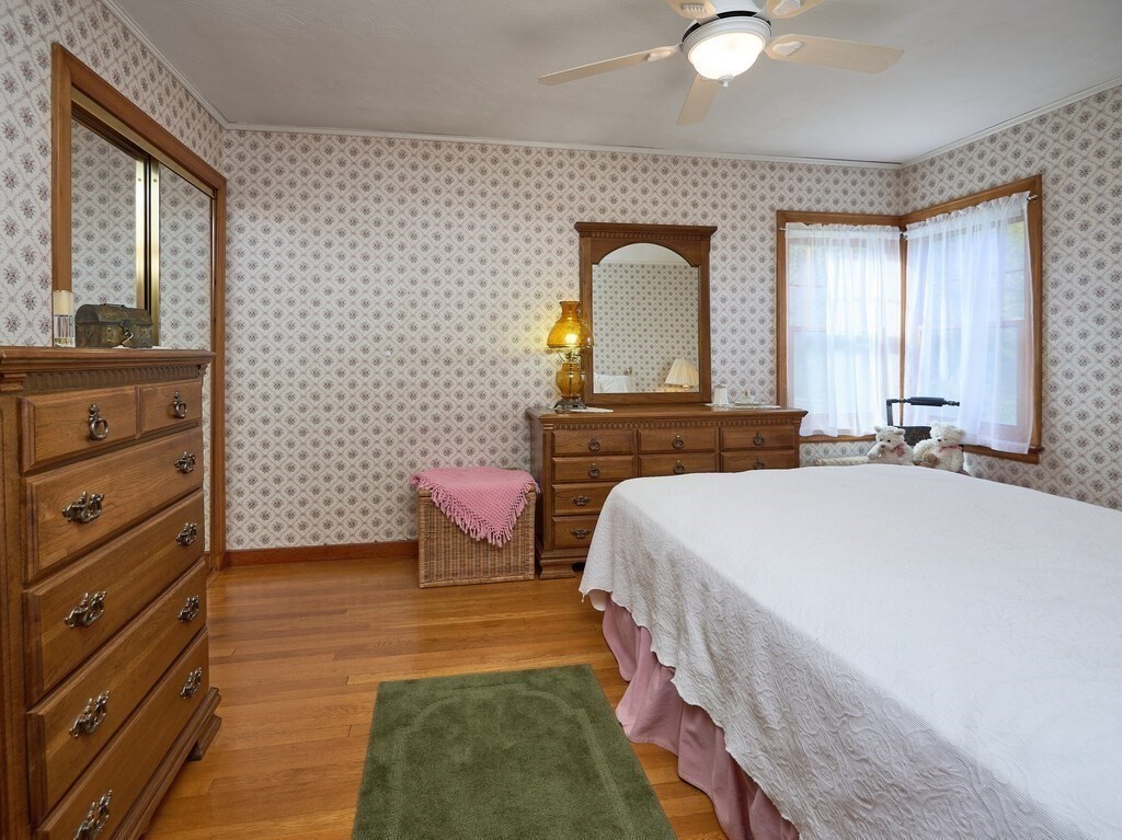 71 Old Common Road Lancaster, MA 01523 - Photo 15 of 39 a bedroom with a bed and a dresser