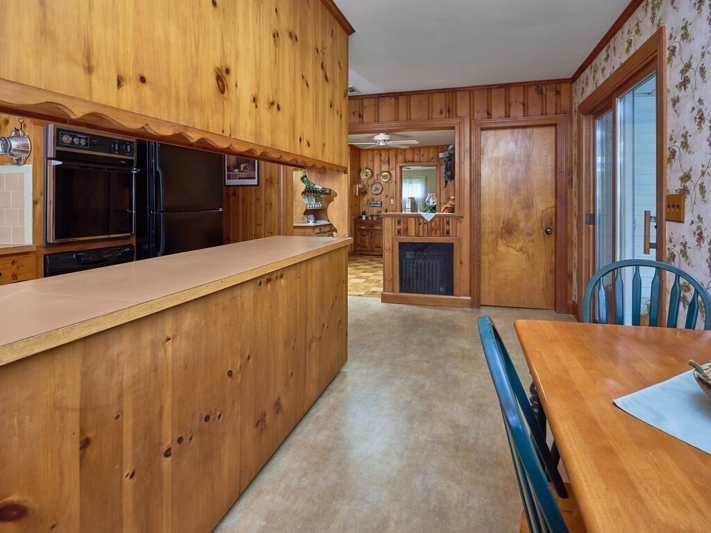 71 Old Common Road Lancaster, MA 01523 - Photo 7 of 39 a view of a kitchen cabinets and wooden floor