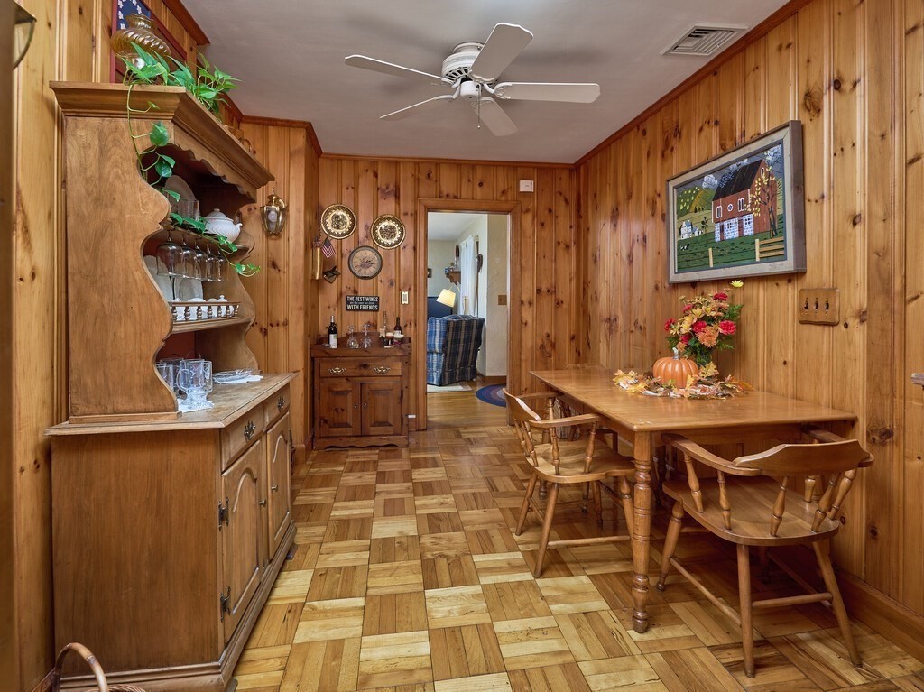 71 Old Common Road Lancaster, MA 01523 - Photo 10 of 39 a view of a dining room with furniture and chandelier