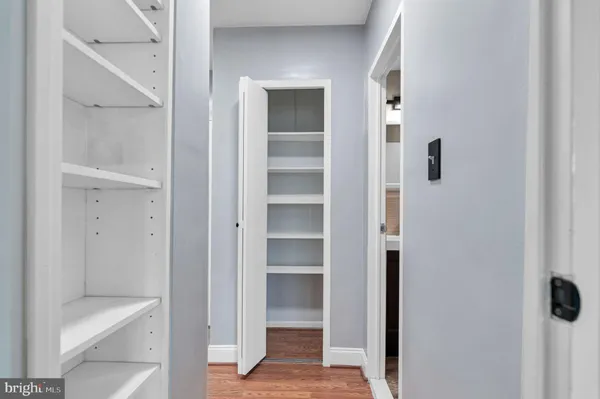a view of a bathroom from a hallway