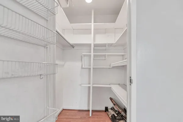a view of an empty walk in closet