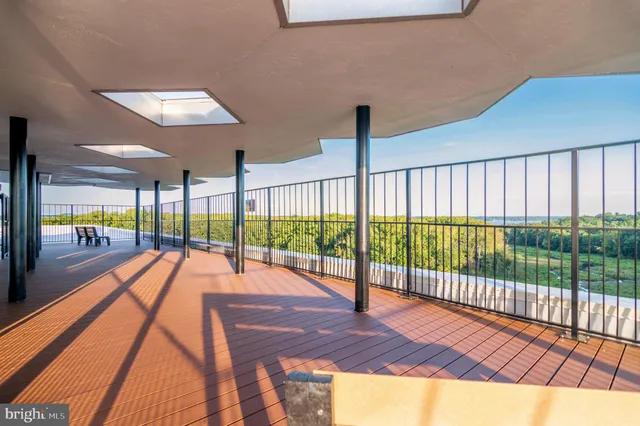 a view of swimming pool with balcony