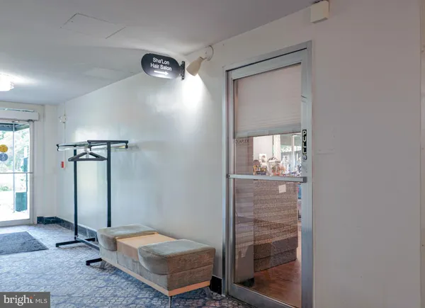 a view of a hallway with front door