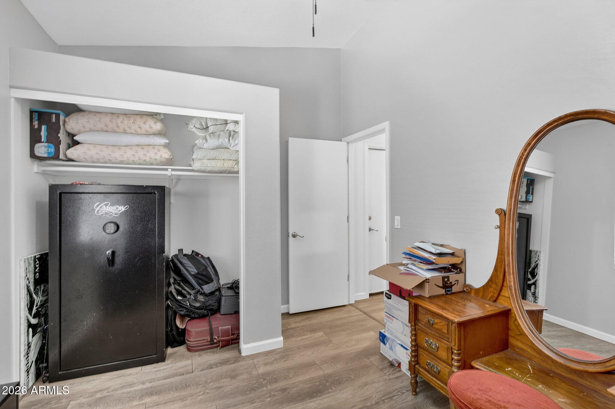 4630 East Dry Creek Road Phoenix, AZ 85044 - Photo 18 of 60 a room with furniture and wooden floor