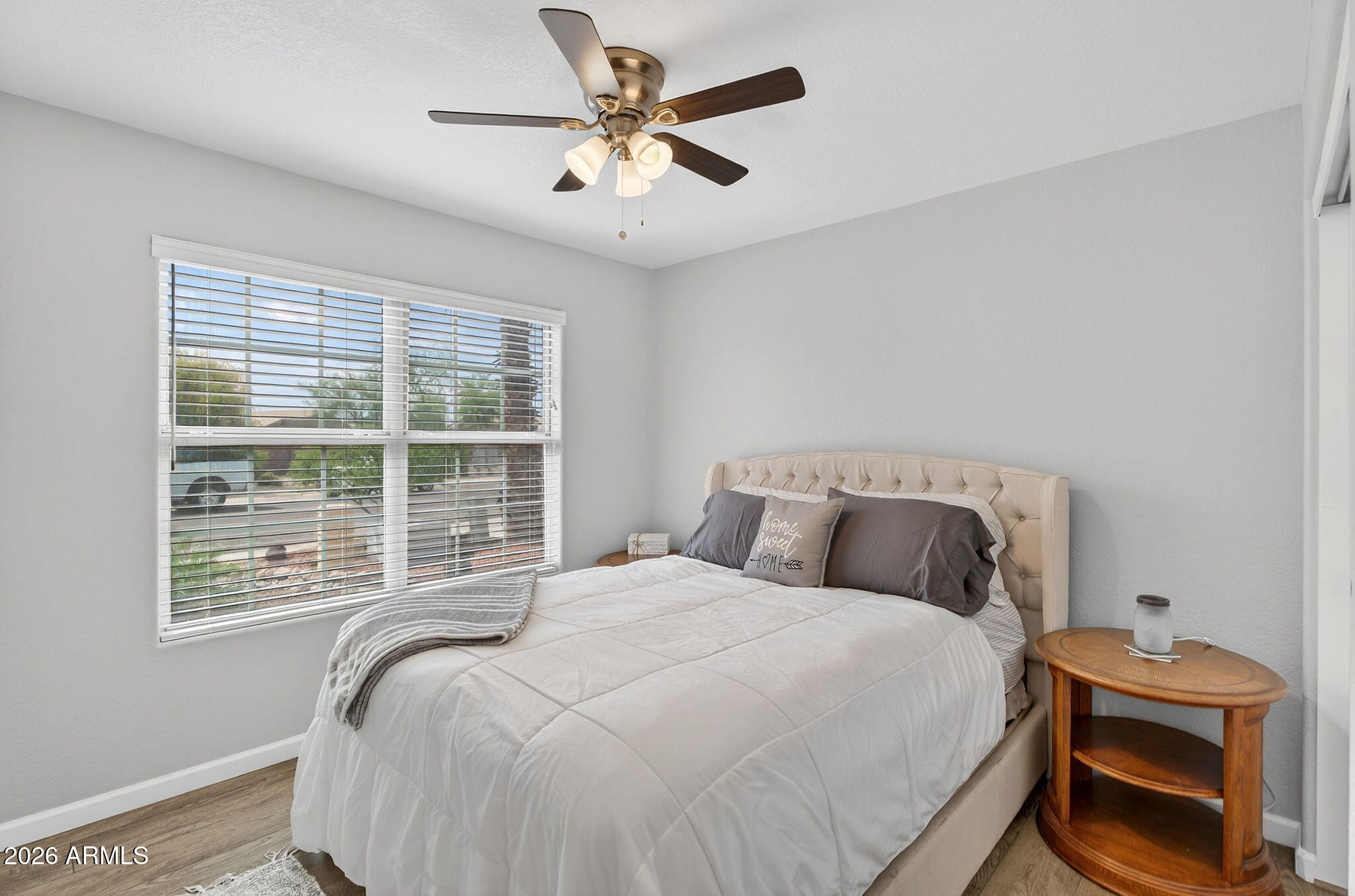 4630 East Dry Creek Road Phoenix, AZ 85044 - Photo 28 of 60 a bedroom with a bed and a window
