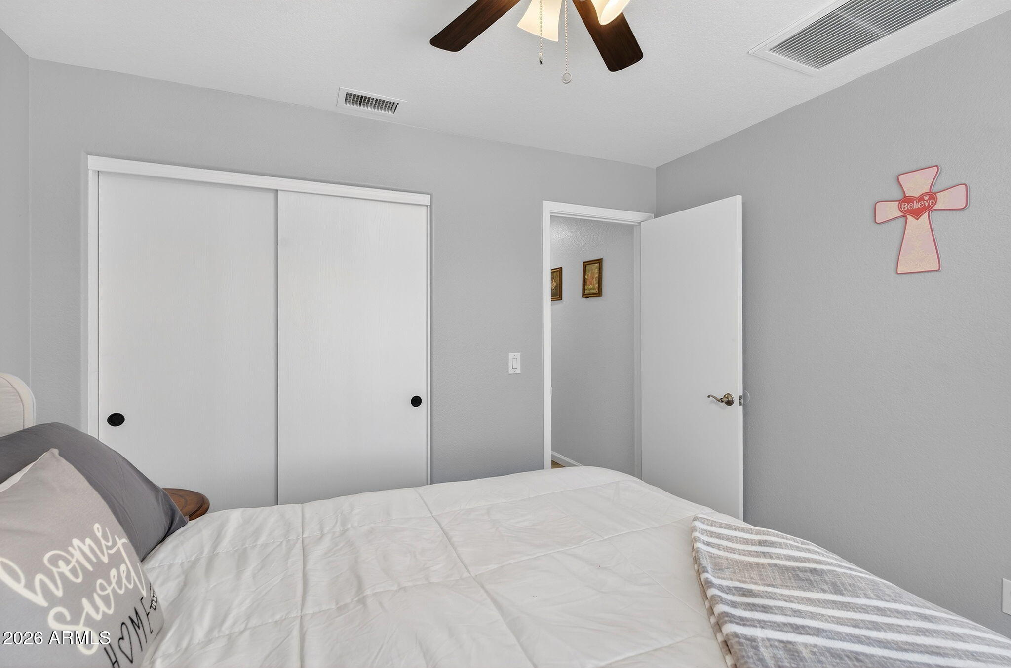 4630 East Dry Creek Road Phoenix, AZ 85044 - Photo 29 of 60 a bedroom with a bed and painting on the wall