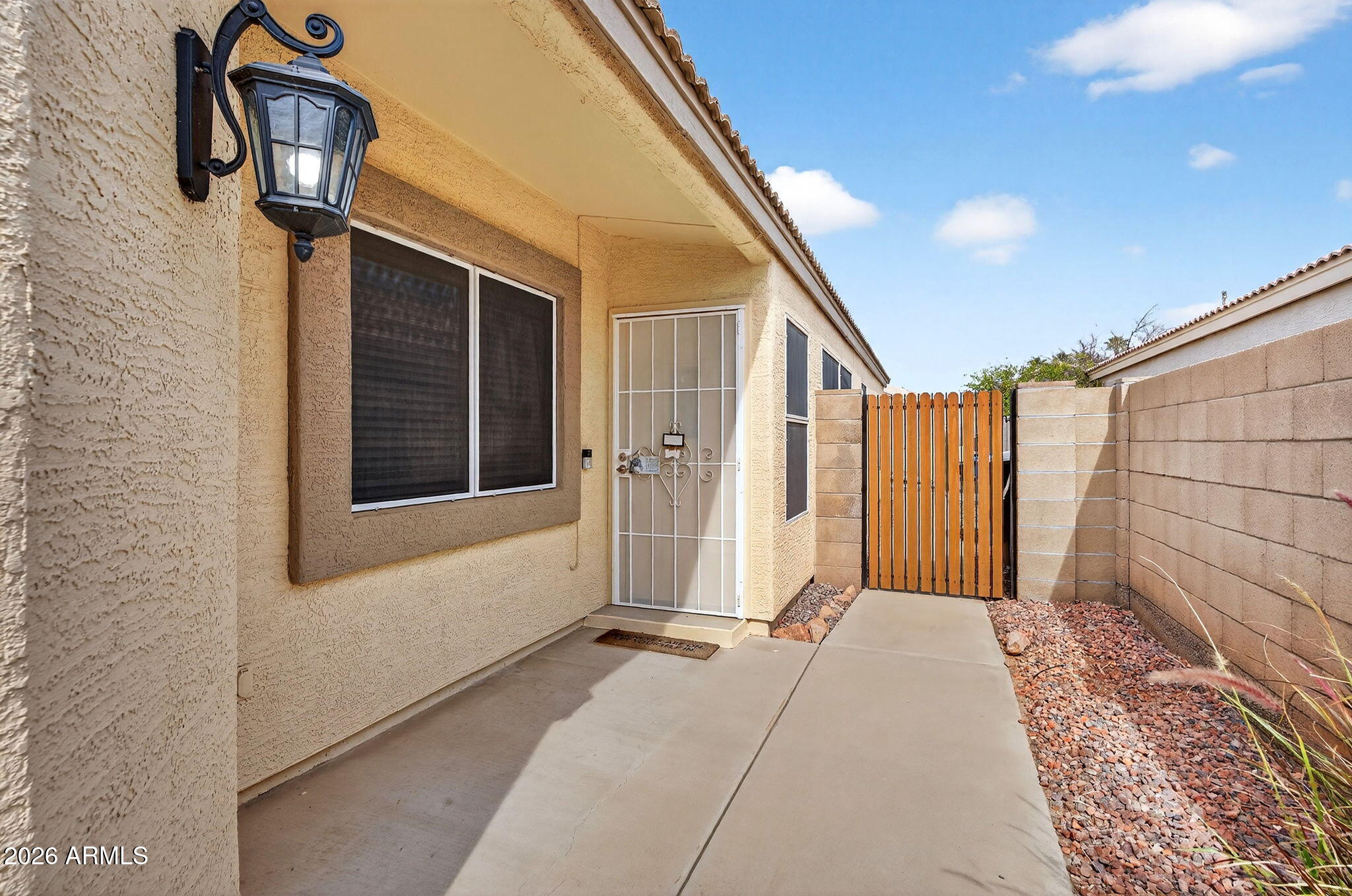 4630 East Dry Creek Road Phoenix, AZ 85044 - Photo 41 of 60 a view of a house with a backyard