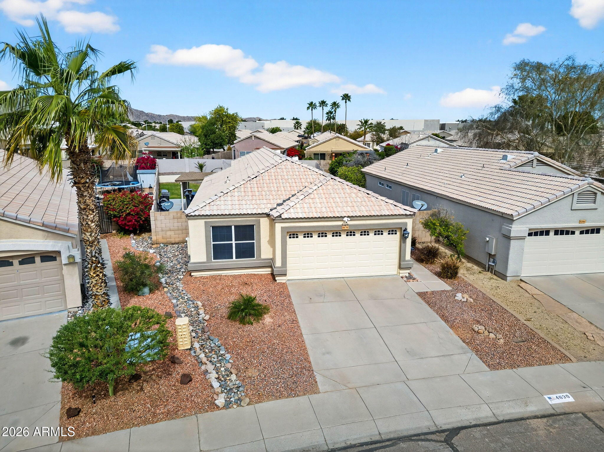 4630 East Dry Creek Road Phoenix, AZ 85044 - Photo 45 of 60 front view of a house with a yard
