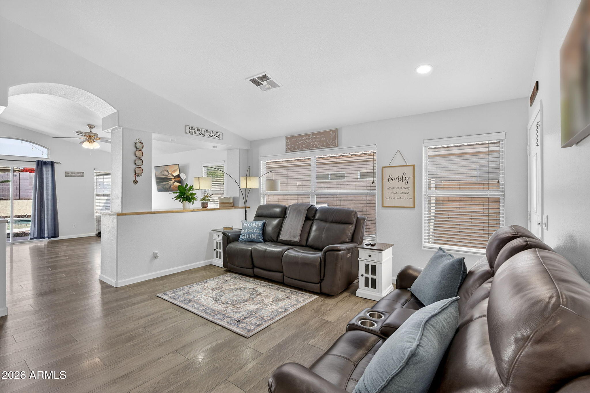 4630 East Dry Creek Road Phoenix, AZ 85044 - Photo 5 of 60 a living room with furniture and wooden floor