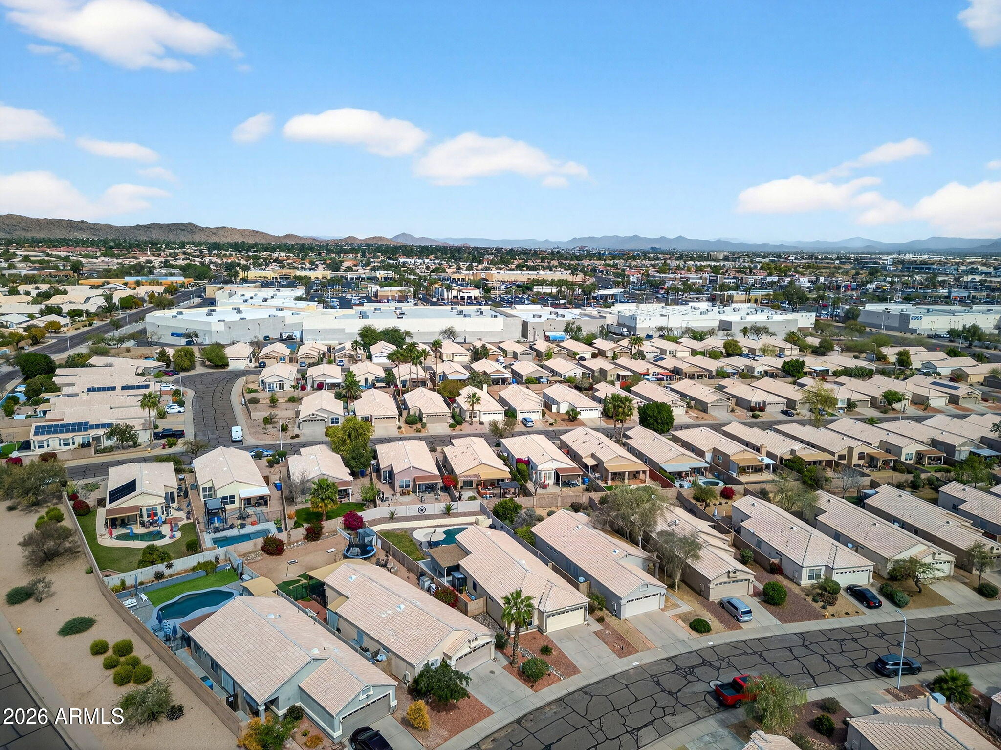 4630 East Dry Creek Road Phoenix, AZ 85044 - Photo 59 of 60 an aerial view of a city with lots of residential buildings