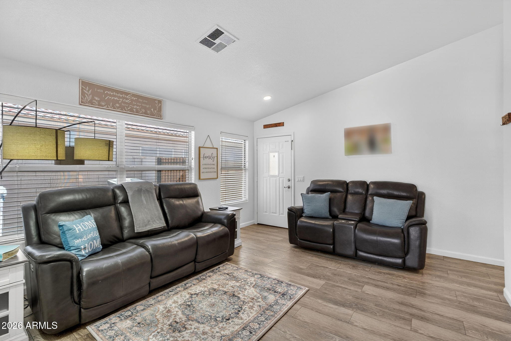 4630 East Dry Creek Road Phoenix, AZ 85044 - Photo 6 of 60 a living room with furniture and a couch