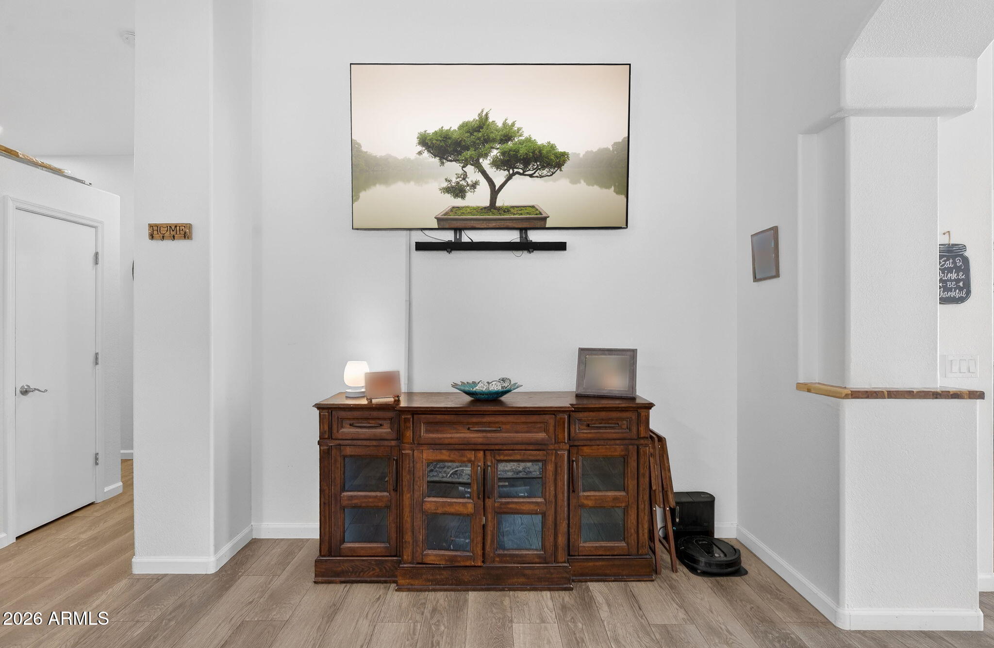 4630 East Dry Creek Road Phoenix, AZ 85044 - Photo 7 of 60 a view of a workspace with furniture and wooden floor
