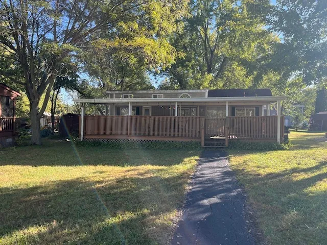 a view of a house with swimming pool