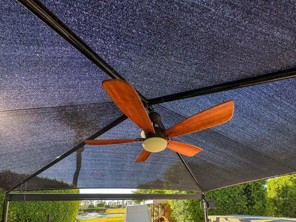 a view of a swimming pool with an outdoor space and seating area