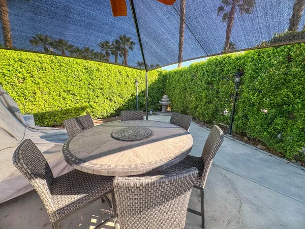 a view of a swimming pool with a patio