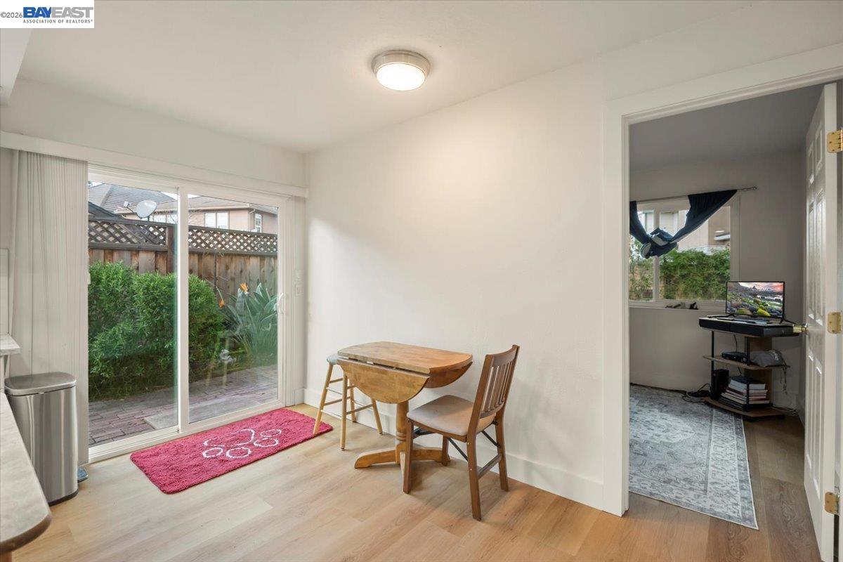 298 Edwin Way Hayward, CA 94544 - Photo 12 of 24 a yoga room with furniture and a potted plant