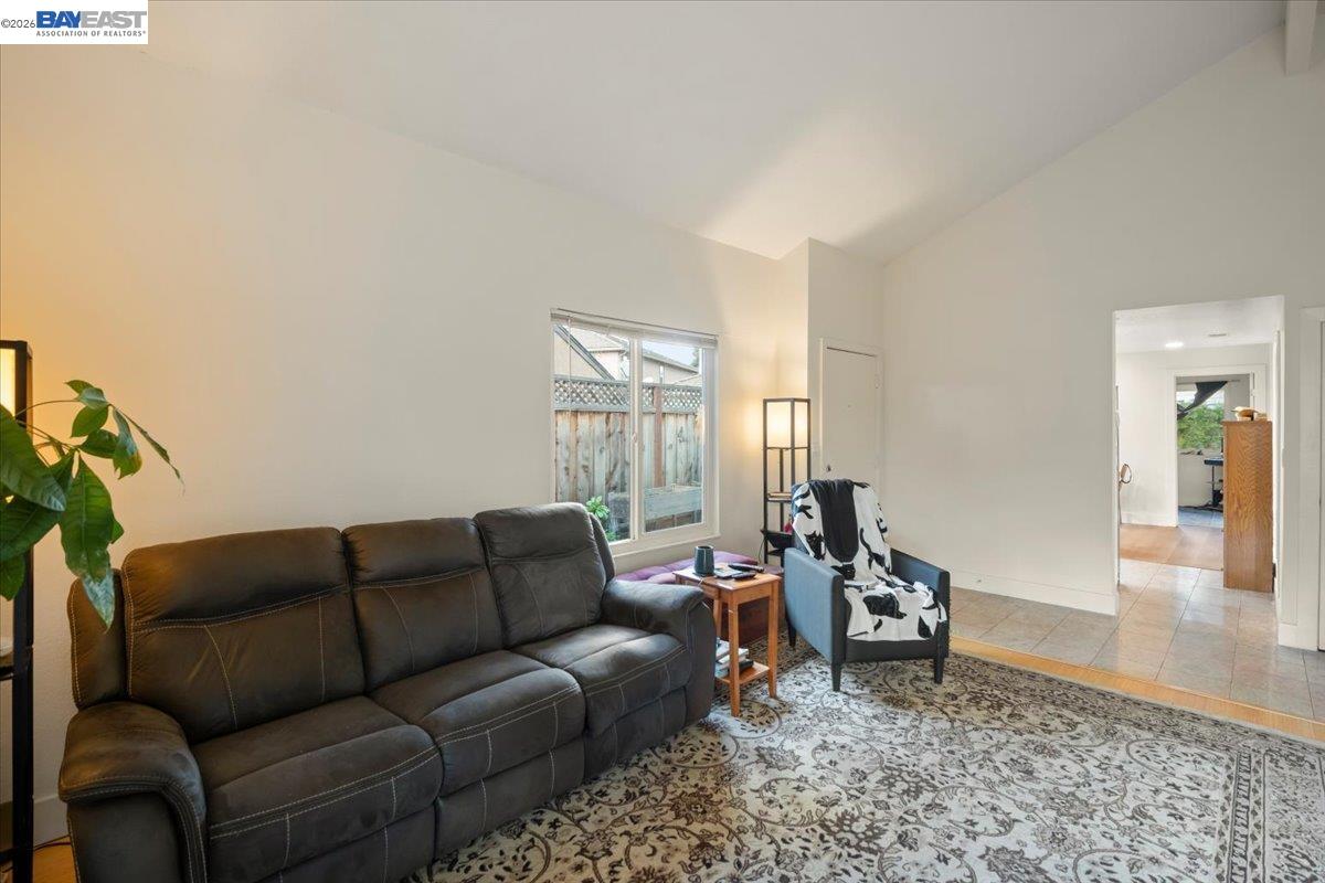 298 Edwin Way Hayward, CA 94544 - Photo 13 of 24 a living room with furniture and a rug