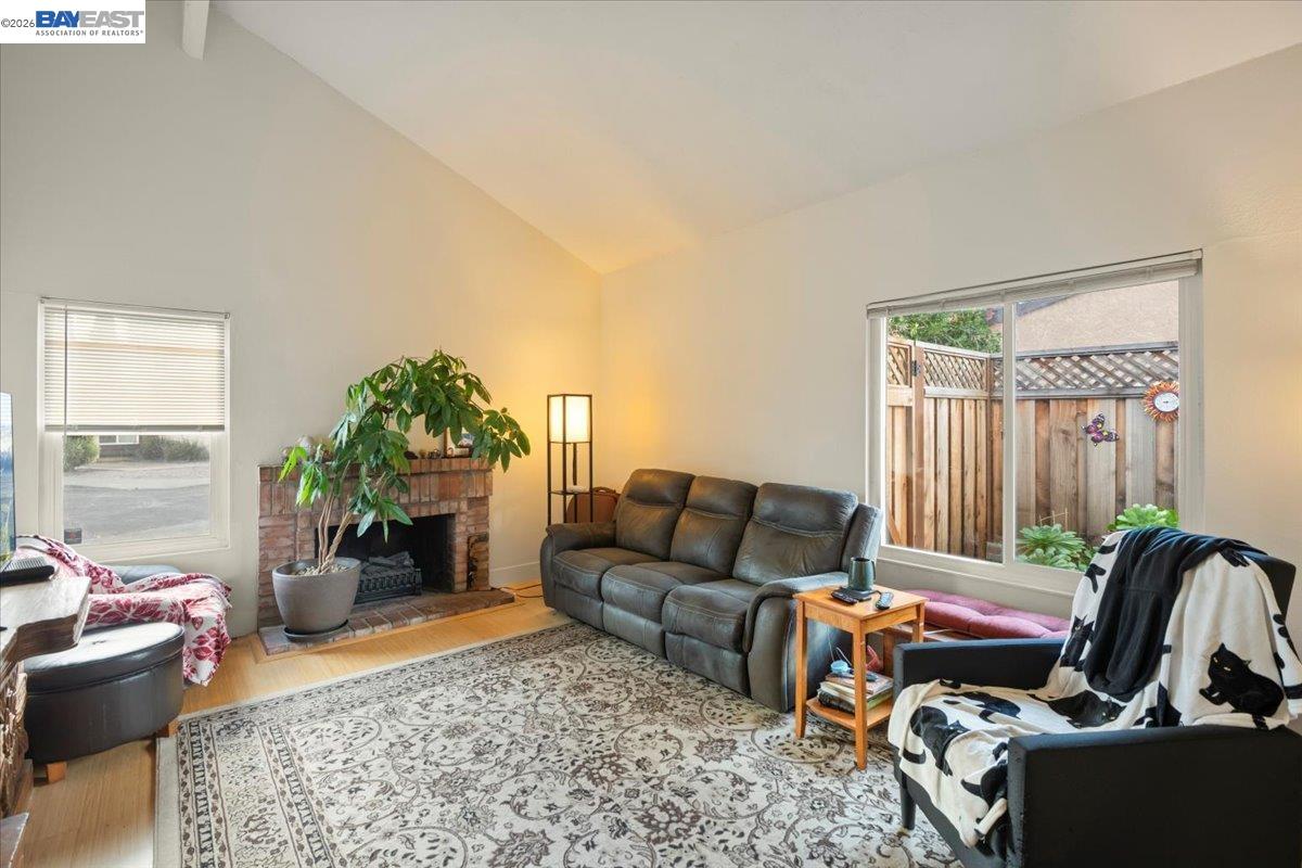 298 Edwin Way Hayward, CA 94544 - Photo 14 of 24 a living room with furniture and a potted plant