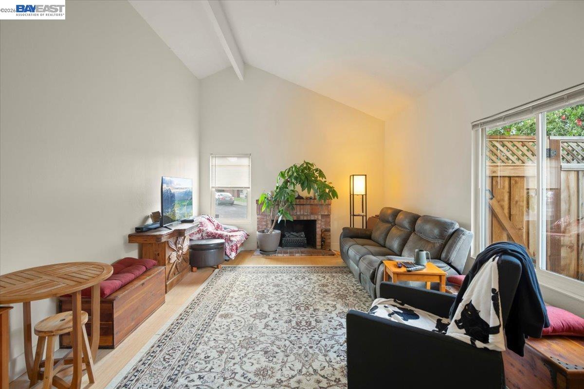 298 Edwin Way Hayward, CA 94544 - Photo 15 of 24 a living room with furniture and a fireplace