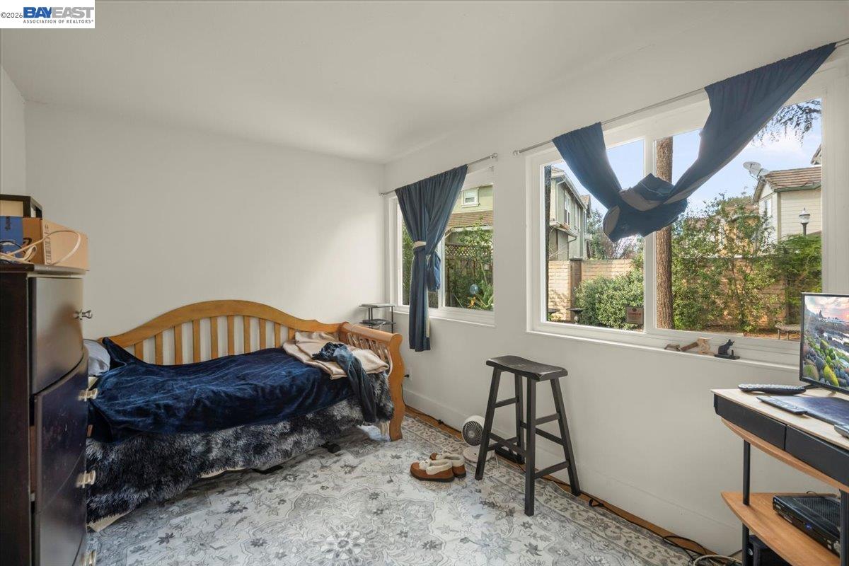 298 Edwin Way Hayward, CA 94544 - Photo 19 of 24 a bedroom with furniture and a window