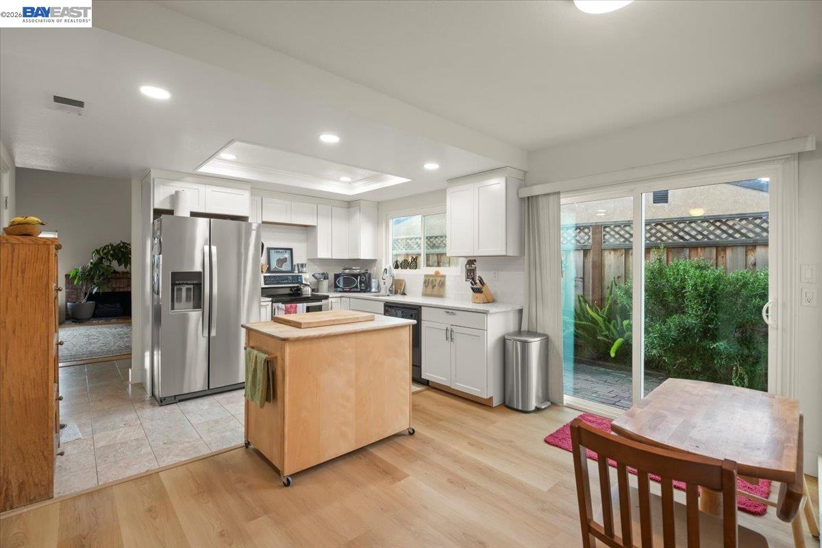 298 Edwin Way Hayward, CA 94544 - Photo 10 of 24 a kitchen with refrigerator and stove