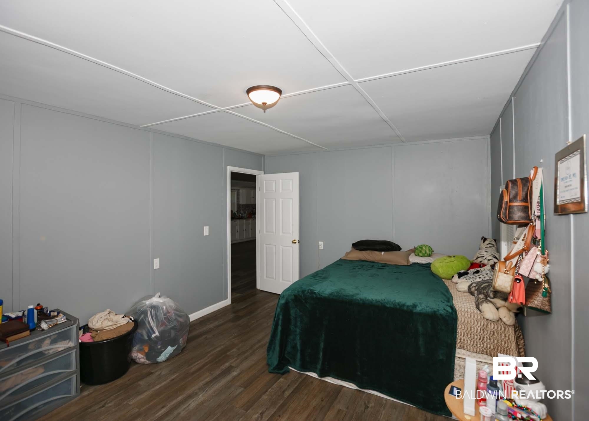 11998 Workman Avenue Foley, AL 36535 - Photo 19 of 59 Bedroom featuring wood finished floors
