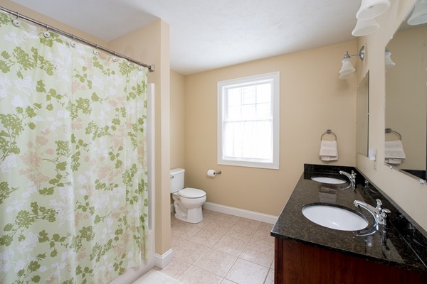58 Snake Hill Road Ayer, MA 01432 - Photo 12 of 22 a bathroom with a sink and a mirror