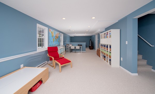 58 Snake Hill Road Ayer, MA 01432 - Photo 20 of 22 a room with furniture and air hockey table