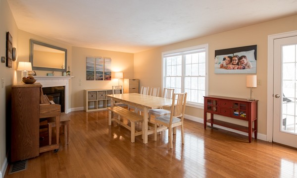 58 Snake Hill Road Ayer, MA 01432 - Photo 2 of 22 a living room with furniture a fireplace and a flat screen tv