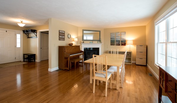 58 Snake Hill Road Ayer, MA 01432 - Photo 3 of 22 a view of a dining room with furniture and wooden floor