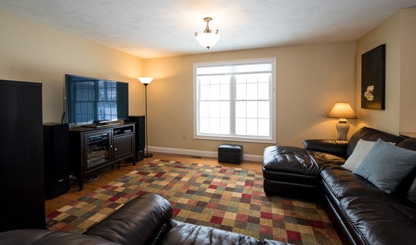 58 Snake Hill Road Ayer, MA 01432 - Photo 7 of 22 a living room with furniture and a window
