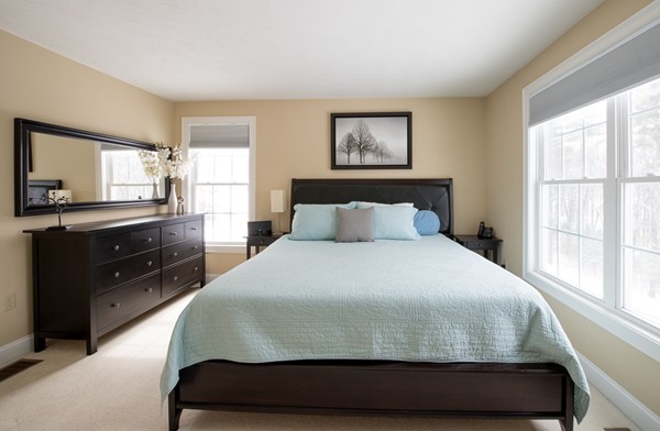 58 Snake Hill Road Ayer, MA 01432 - Photo 10 of 22 a bedroom with a bed and a dresser