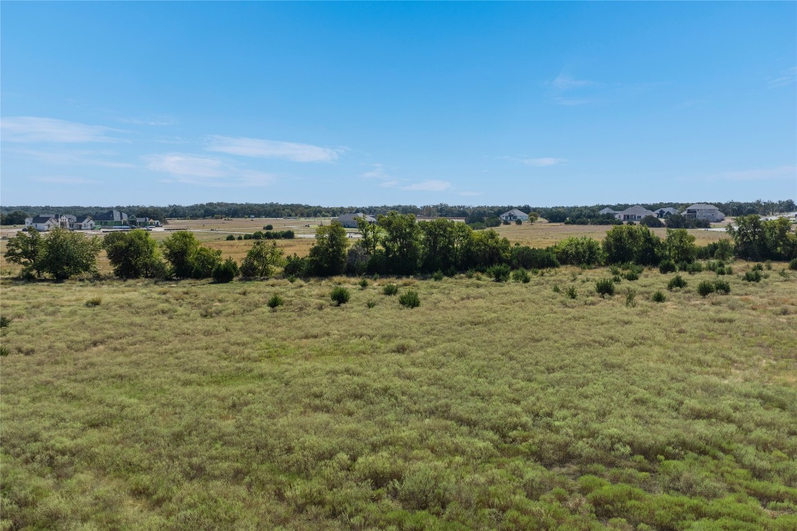 301 County Road 246 Georgetown, TX 78633 - Photo 12 of 15 a view of a field with an ocean