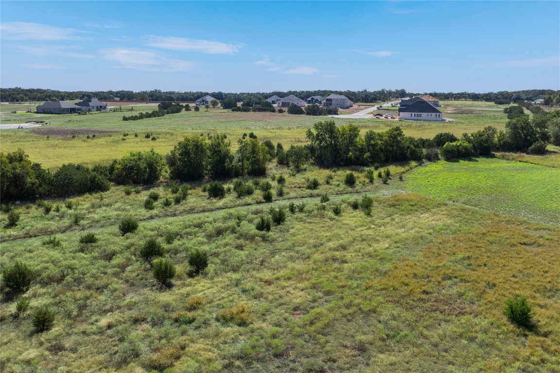 301 County Road 246 Georgetown, TX 78633 - Photo 15 of 15 a view of a green field with an ocean view