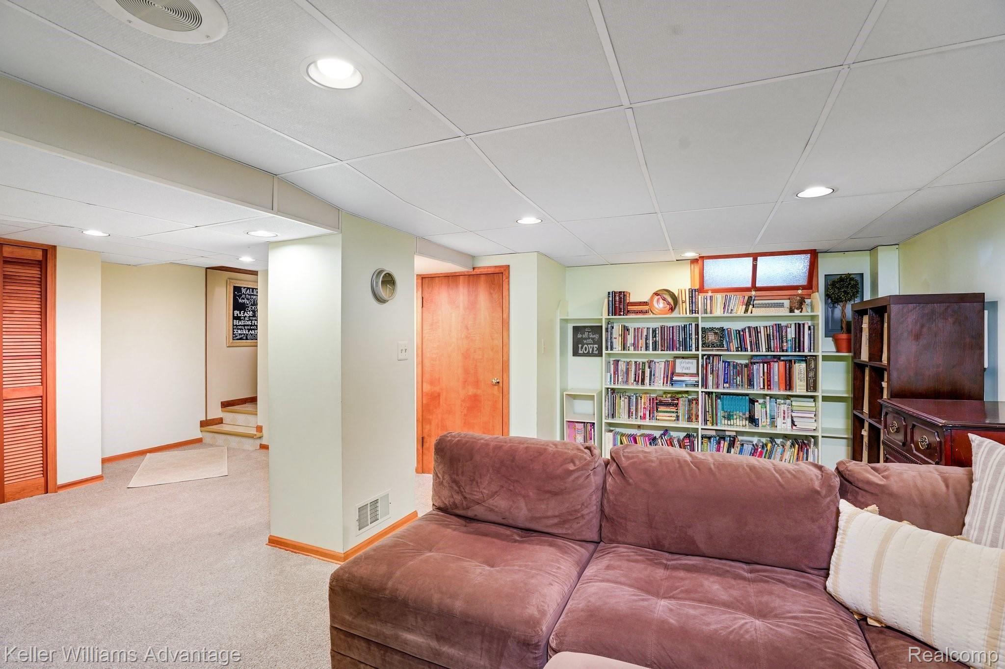 543 Reed Street Northville, MI 48167 - Photo 22 of 36 Finished basement w large 3 X 3 cedar closet