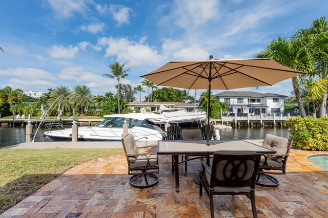 a view of a yard and front view of a house