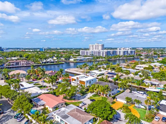 an aerial view of a city with lots of residential buildings