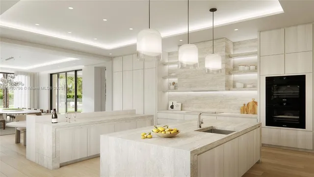 a kitchen with stainless steel appliances granite countertop a sink a counter space and windows