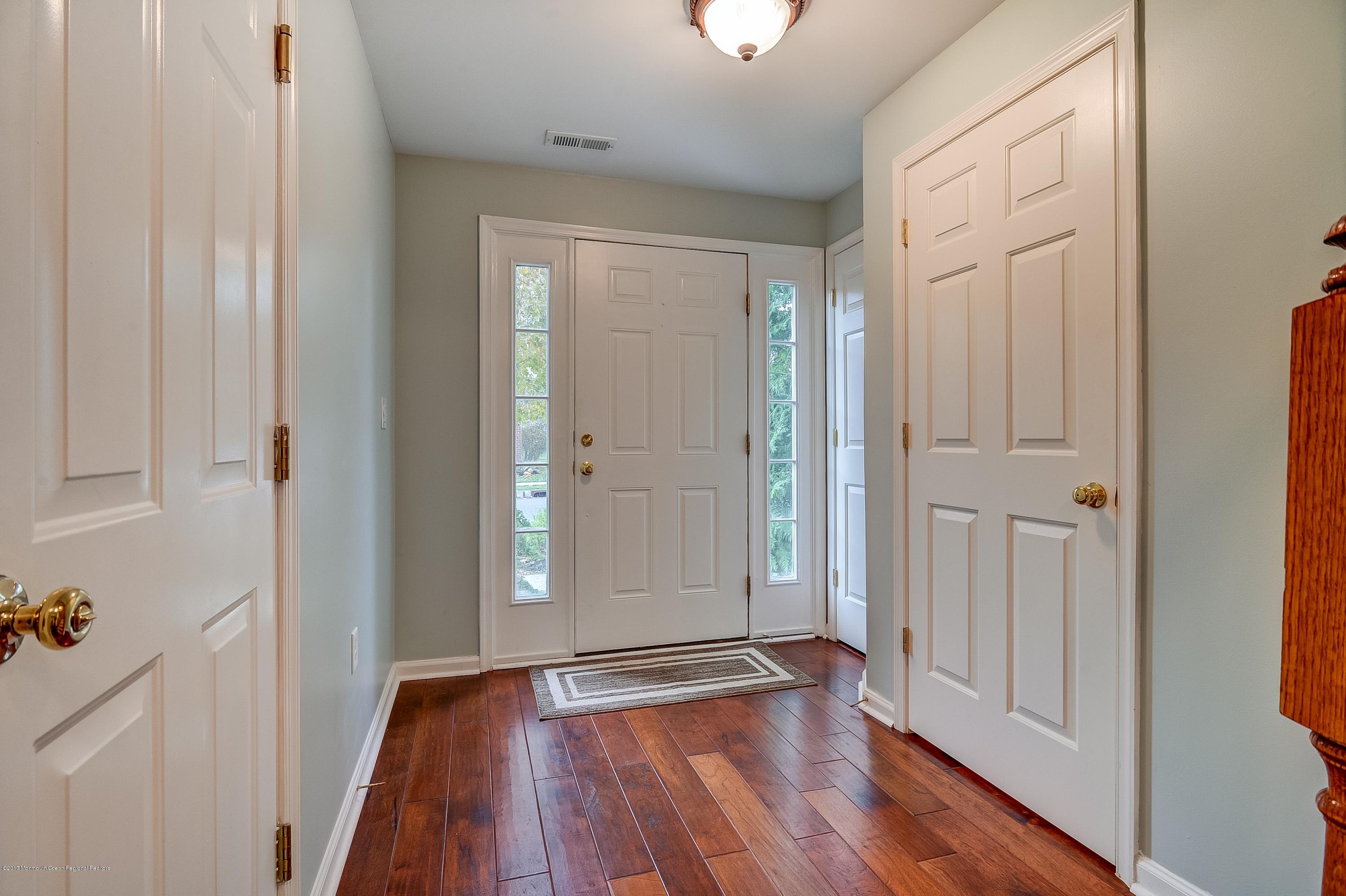31 Saxton Road, Unit 53 Farmingdale, NJ 07727 - Photo 3 of 25 wooden floor in an empty room