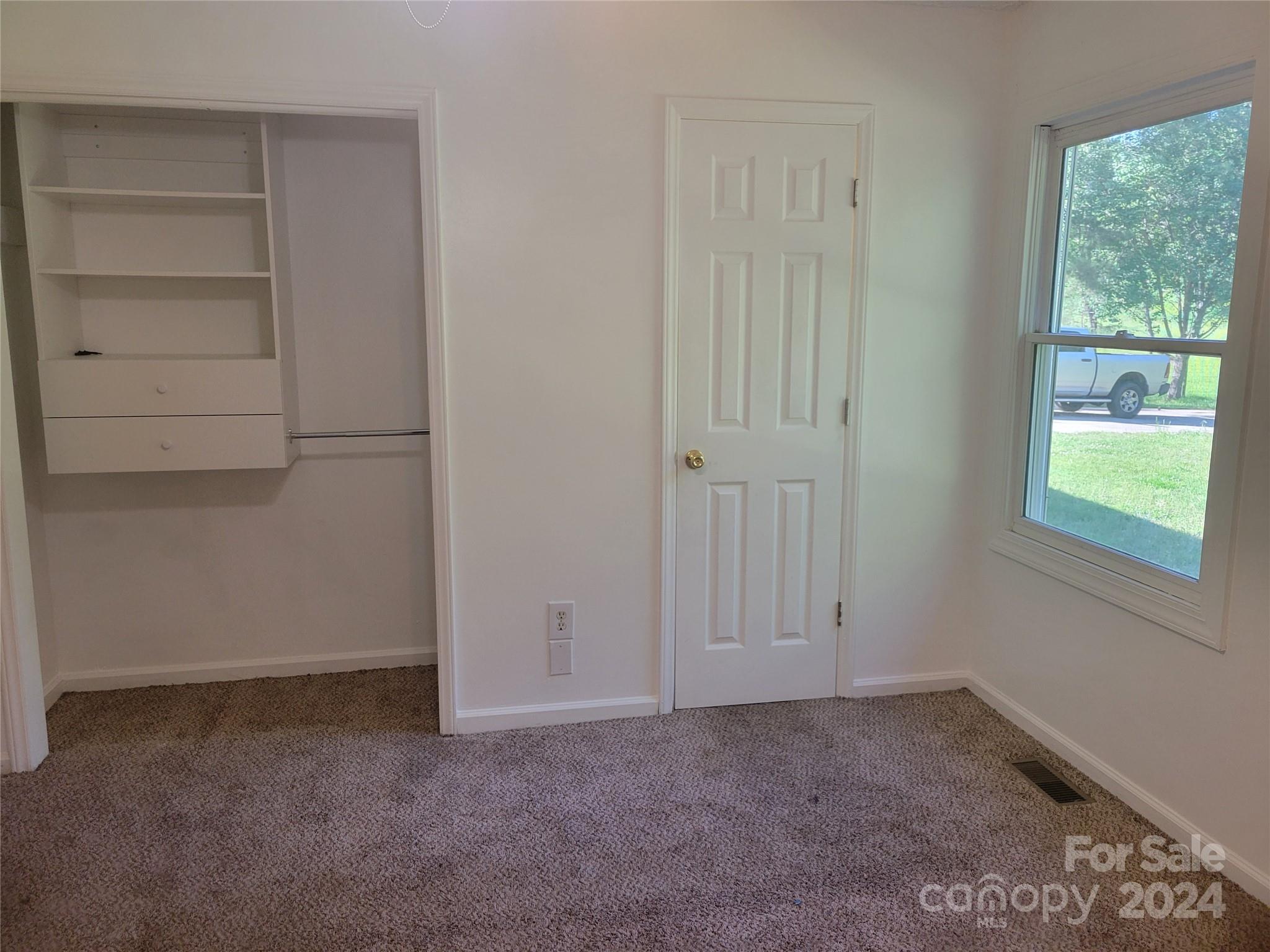 830 Long Branch Road Grover, NC 28073 - Photo 20 of 37 an empty room with windows