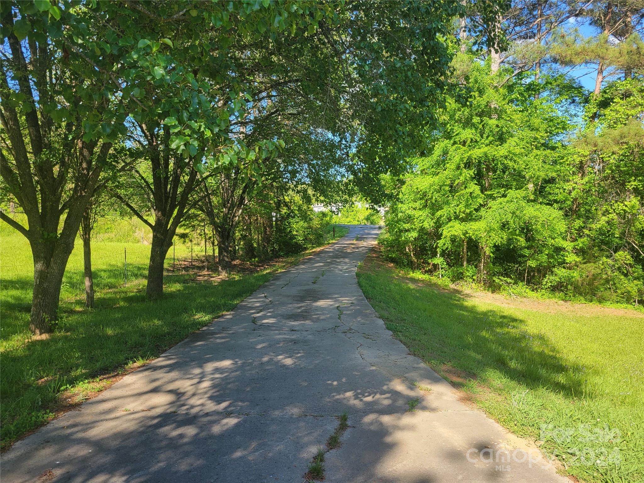 830 Long Branch Road Grover, NC 28073 - Photo 36 of 37 a view of a street with a yard