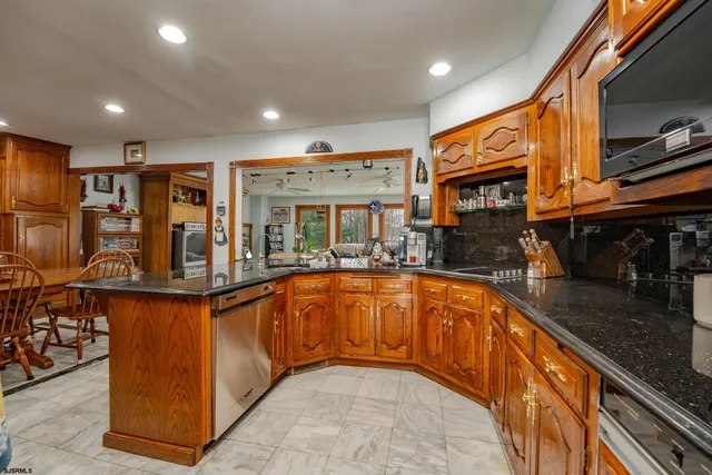 a bed room with a bed and a chair