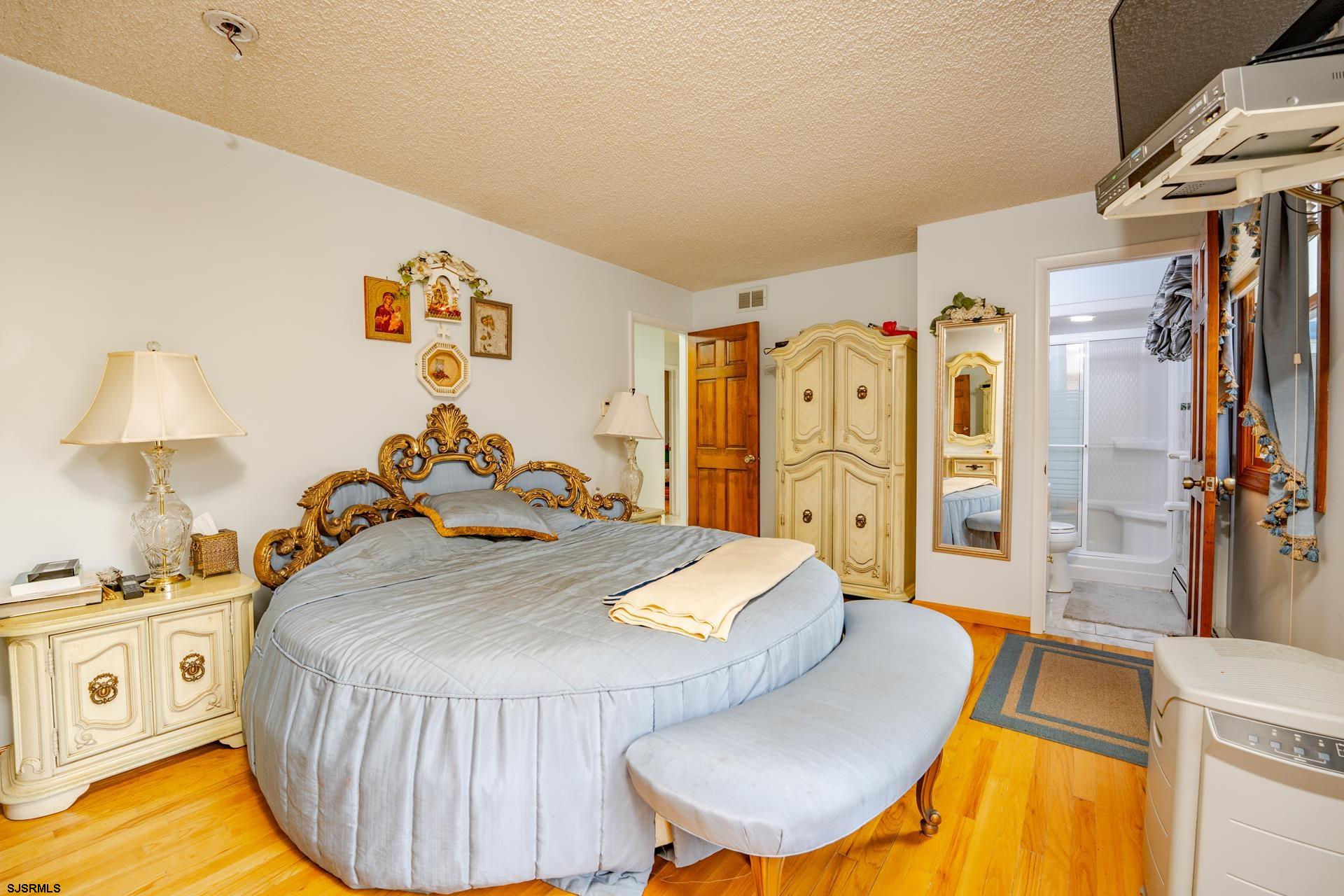 953 Chestnut Avenue Sewell, NJ 08080 - Photo 17 of 76 a bed room with a bed and a chair