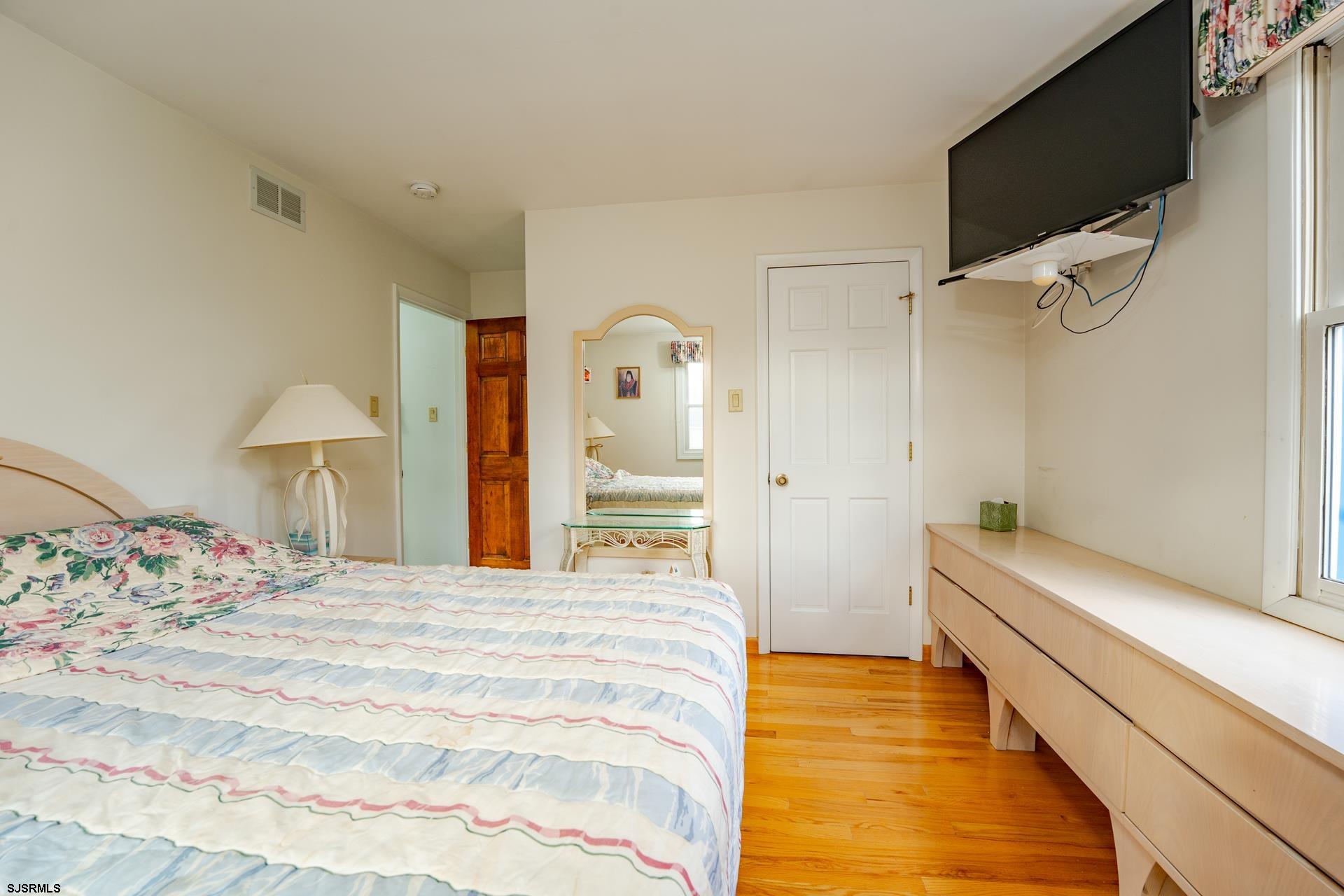 953 Chestnut Avenue Sewell, NJ 08080 - Photo 19 of 76 a spacious bedroom with a bed and a walk in closet