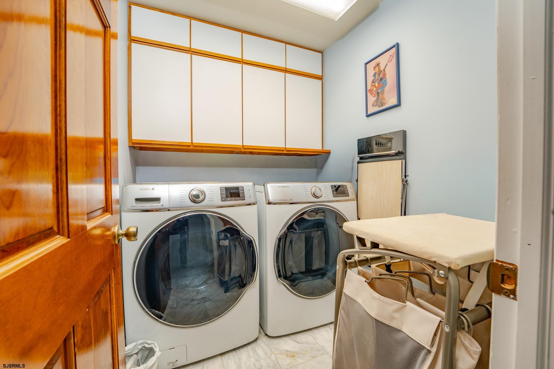 953 Chestnut Avenue Sewell, NJ 08080 - Photo 30 of 76 a utility room with dryer and washer
